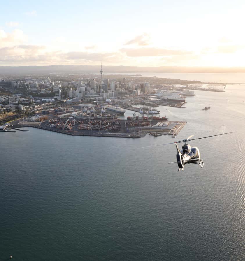 Auckland: 20min Helicopter scenic flight - City & Volcanoes - First look: Albany (Rosedale) to takeoff momentum