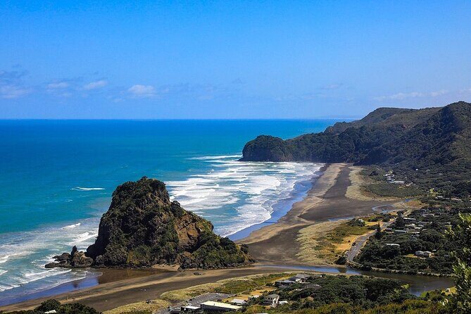 Explore West Auckland with Winery - Muriwai Beach: black sand, surf energy, and a quick reset