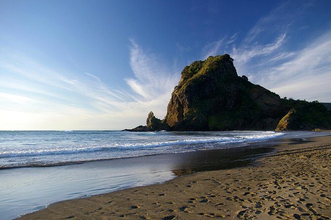 Piha Waitakere Rainforest Wine Tour from Auckland - Piha Beach: Black Sand, Big Surf, and Short but Sweet Time