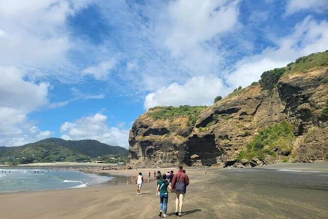Private Auckland West Coast Tour Piha Beach and Karekare Falls - Piha Beach: black sand, surf energy, and postcard coastline